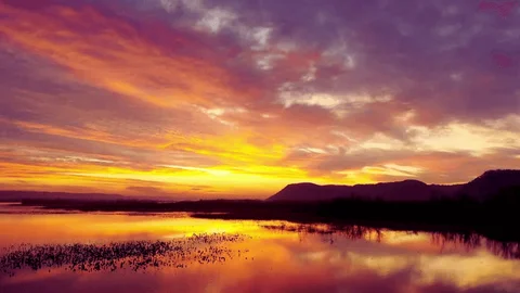 Watch a Peaceful Sunset by the River